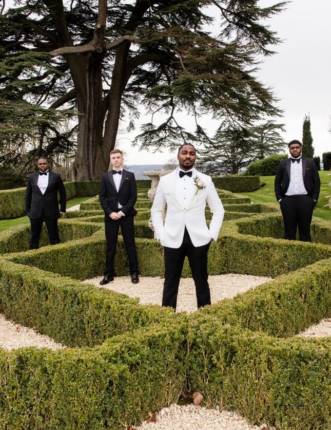 Groomsmen photo in garden at Hedsor House