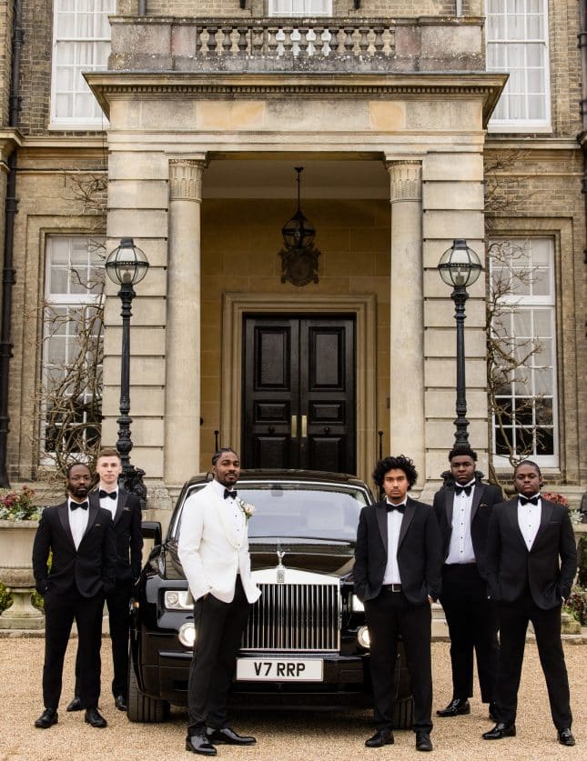 Groom with groomsmen and Rolls Royce outside Hedsor House